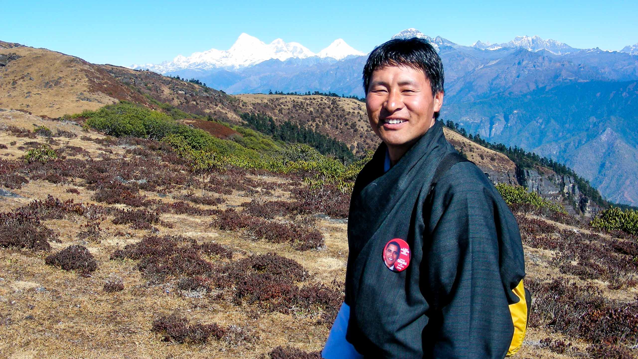 Bhutan man hikes through mountains