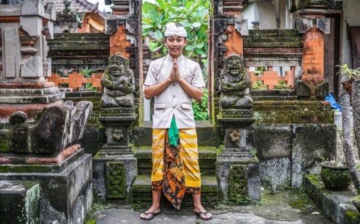 Balinese boy anjali mudra hand posture
