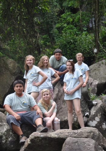 group of students on rocks